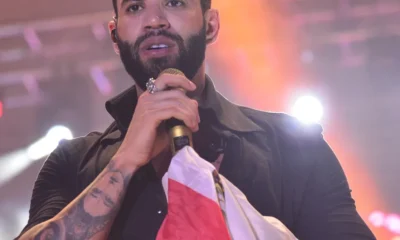 Decisão Judicial: Gusttavo Lima Indenizará Fã Expulsa de Show por Gesto Político